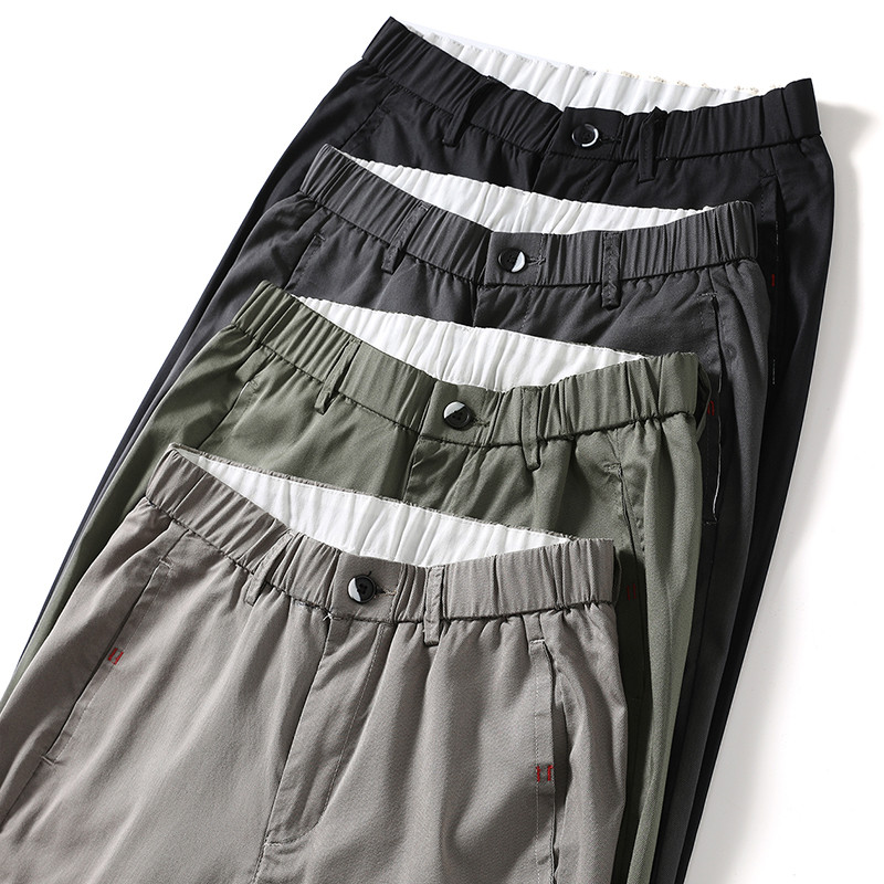 2023. aasta uued brändiriided, suvine pehme, hubane Lyocell vabaaja püksid meeste õhukesed venivad õhukesed pahkluu püksid Korea rohelised püksid meestele