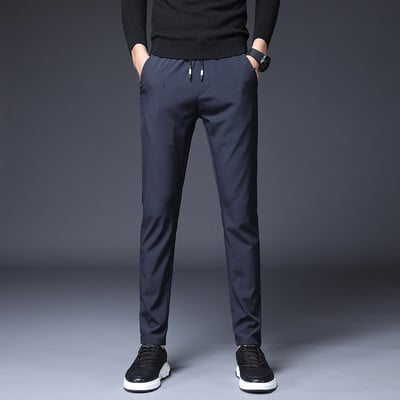 Sügisene paksud meeste sörkimispüksid, nööriga elastne vöökoht vabaaja välitreening Fitness Spordipüksid jooksupüksid meestele