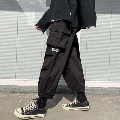 Tänavarõivad Meeste püksid Punk Stiil Kevadsuvi Hip Hop Meeste avarad laia säärepüksid Jogger rula dressipüksid taskute paeltega