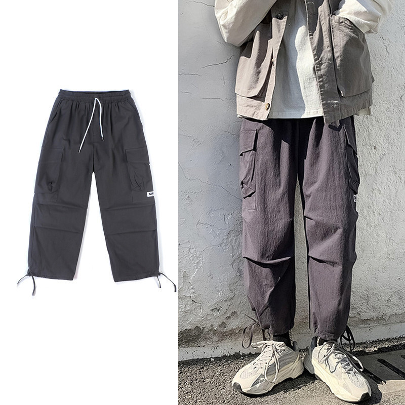 Tänavarõivad Meeste püksid Punk Stiil Kevadsuvi Hip Hop Meeste avarad laia säärepüksid Jogger rula dressipüksid taskute paeltega