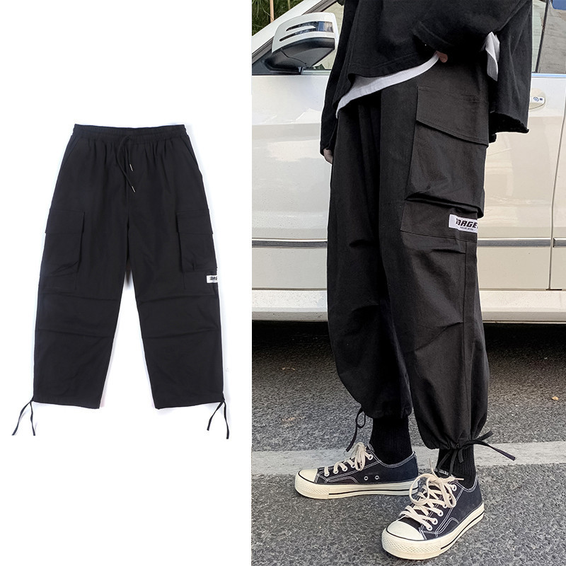 Tänavarõivad Meeste püksid Punk Stiil Kevadsuvi Hip Hop Meeste avarad laia säärepüksid Jogger rula dressipüksid taskute paeltega