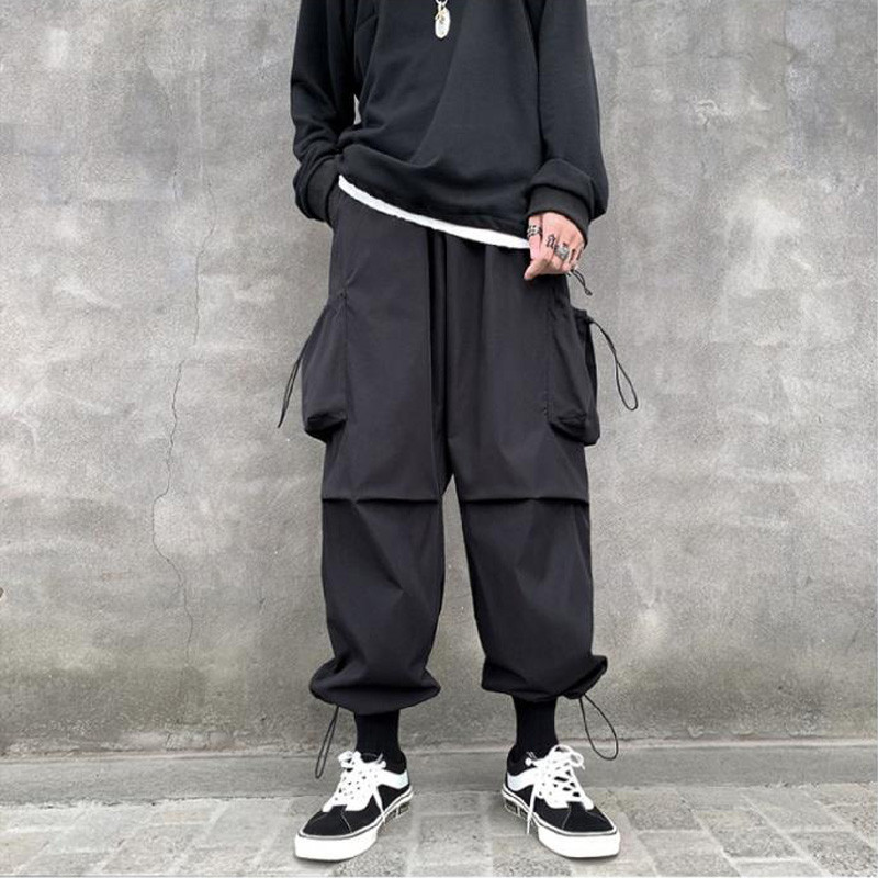 Kevadsuvi vabaaja meeste haaremipüksid punk-stiilis suur tasku vanaaegsed kaubapüksid igapäevaselt kohalolek Töö kottis jooksjad meeste püksid