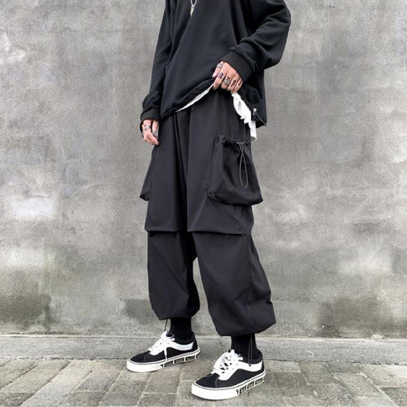 Kevadsuvi vabaaja meeste haaremipüksid punk-stiilis suur tasku vanaaegsed kaubapüksid igapäevaselt kohalolek Töö kottis jooksjad meeste püksid