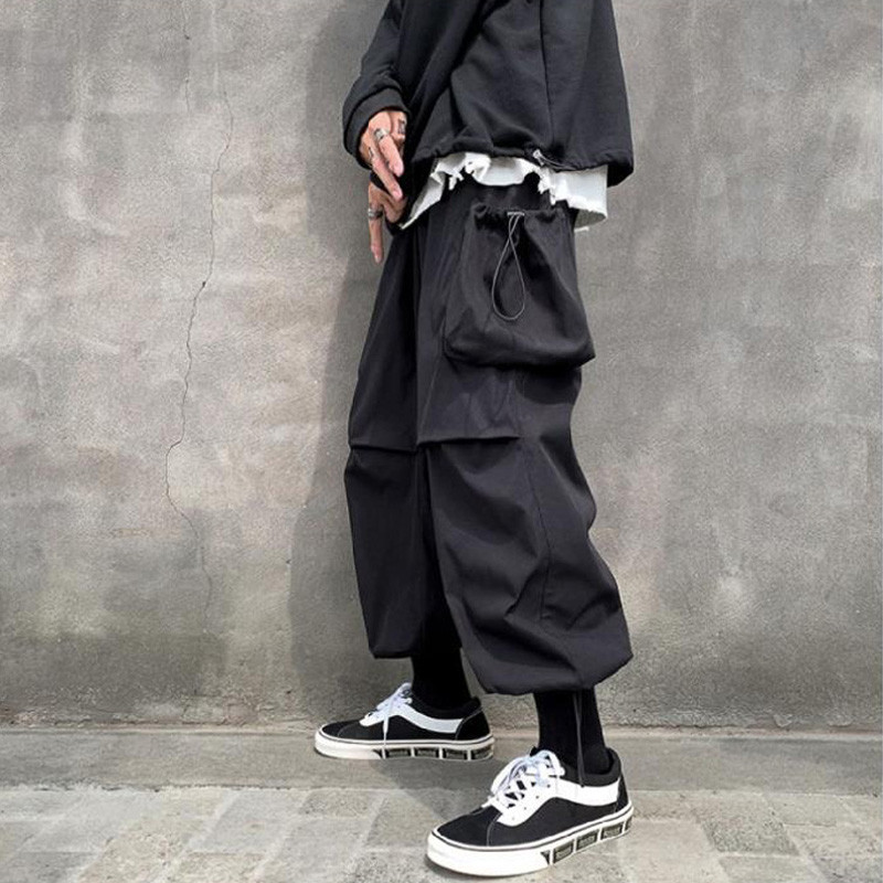 Kevadsuvi vabaaja meeste haaremipüksid punk-stiilis suur tasku vanaaegsed kaubapüksid igapäevaselt kohalolek Töö kottis jooksjad meeste püksid