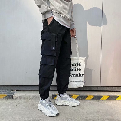 Meeste vabaajarõivad lahtised jooksupüksid meeste sörkimispüksid spordipüksid hip-hop kottis püksid tööriided dressipüksid