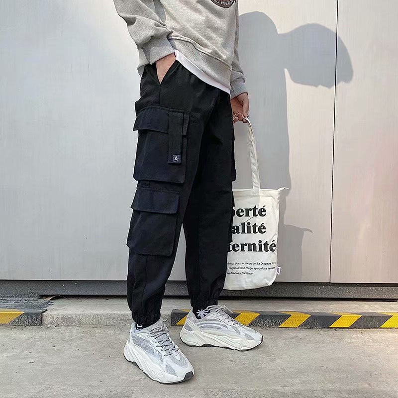 Meeste vabaajarõivad lahtised jooksupüksid meeste sörkimispüksid spordipüksid hip-hop kottis püksid tööriided dressipüksid