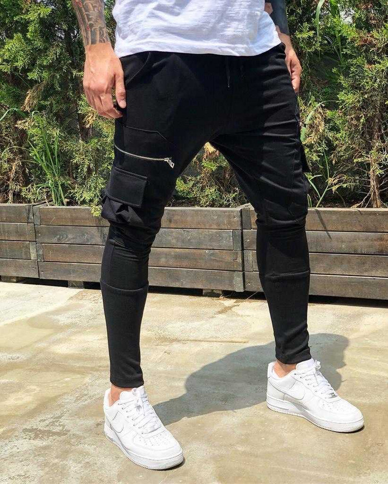 Muscle New Tide brändi mitme taskuga kombinesoonid Meeste püksid Tänavamood Vaba aeg Õues Splicing Õhukesed jalad ja püksid