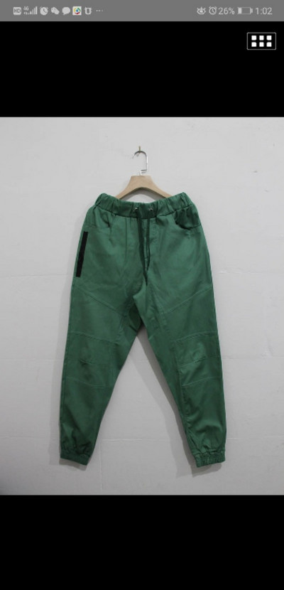 Ležerni muški kombinezon Fitness Territory Novi proizvodi Jednobojni uski muški kombinezon s više džepova Hlače