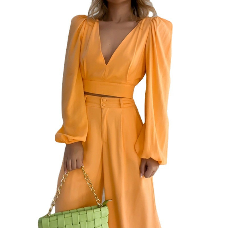 Naiste 2022. aasta sügis, uued V-kaelusega pikkade varrukatega särgid, kõrge vöökohaga laia säärega püksid, suured moodsad vabaaja ülikonnad, kaheosalised komplektid