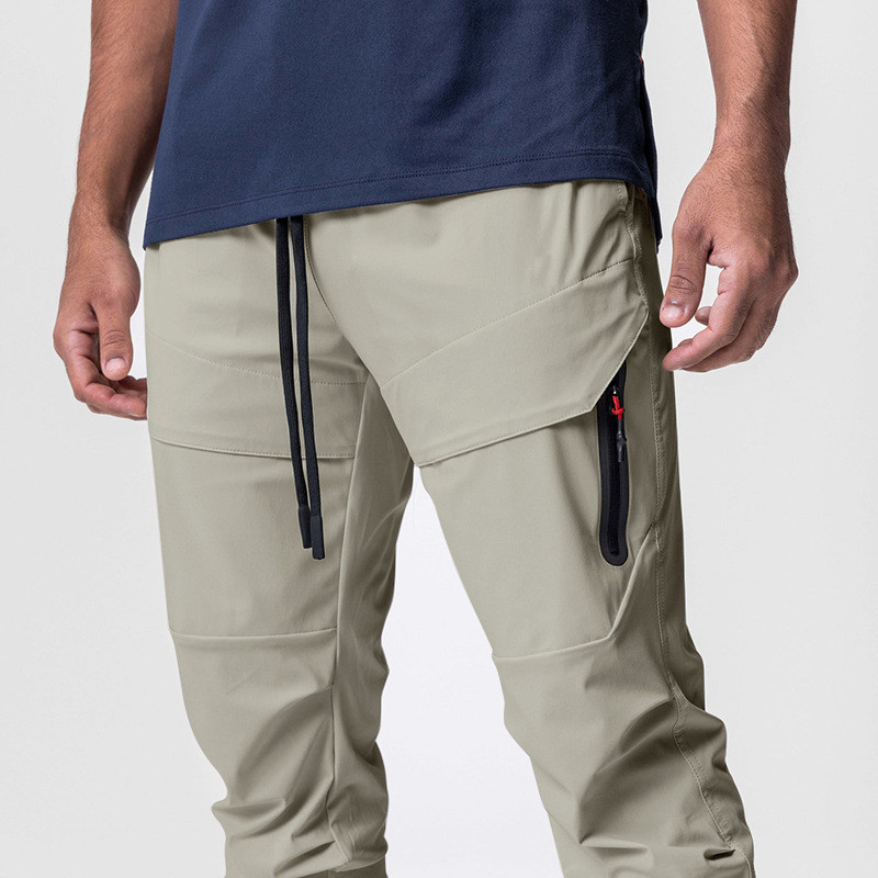 Tanke muške hlače 2023 Fashion Jogger muške sportske hlače Brzosušeće hlače s patentnim zatvaračem Fitness hlače Ulična odjeća Hlače za slobodno vrijeme na otvorenom