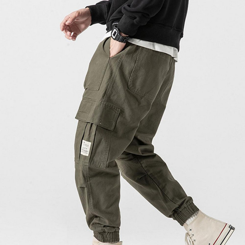 Meeste pükste kombinesoonid ühevärvilised mitme taskuga meeste keskmise vöökohaga nööriga püksid ühevärvilised mitme taskuga meeste püksid