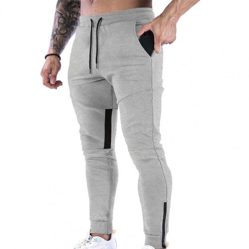 Meeste püksid ühevärvilised pahkluudega pingutusnööriga elastsed vöökohaga langevad püksid elastsed vöökohaga langevad püksid