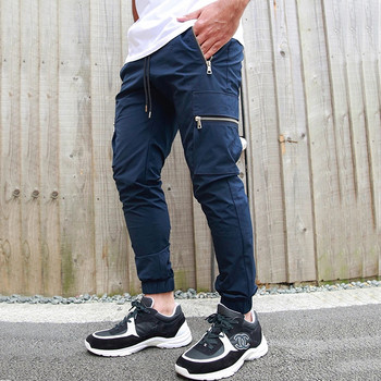 Διασυνοριακή Ευρώπη και Ηνωμένες Πολιτείες αθλητικό φερμουάρ αναψυχής παντελόνι πολλαπλών τσέπης ανδρικό παντελόνι προπόνησης τρεξίματος γυμναστικής κατασκευή