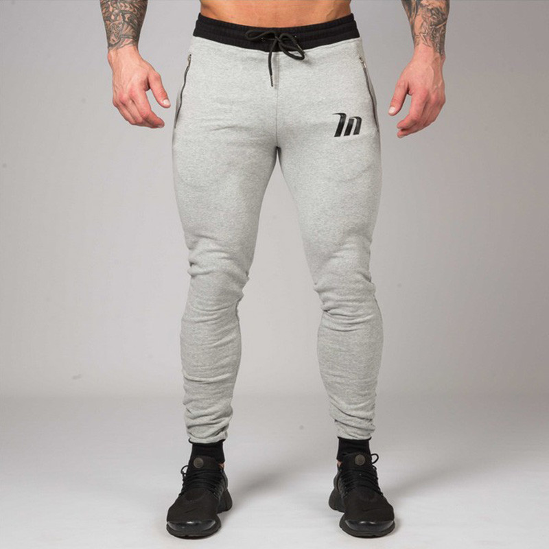Uued Joggers Skinny Dressipüksid Meeste Vabaajapüksid Puuvillased Jooksurajapüksid Meeste Jõusaal Fitness Sport Treening Kulturismi püksid