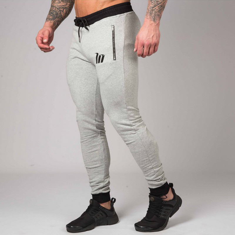Uued Joggers Skinny Dressipüksid Meeste Vabaajapüksid Puuvillased Jooksurajapüksid Meeste Jõusaal Fitness Sport Treening Kulturismi püksid