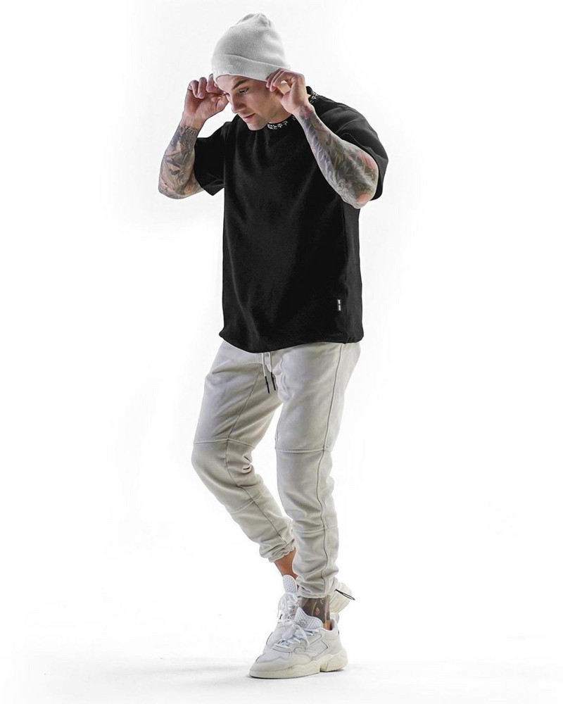 Sportlikud meeste püksid Euroopa ja Ameerika vabaaja puuvillane fitness rippuv rätik püksid treening elastne nöör püksid püksid