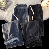 2023. aasta kevad, uus kevadsuvi, meeste lõdvad nööriga teksad Korea mood vintage teksariidest kottis laiad püksid meeste must sinine