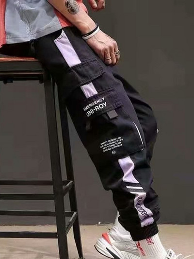 PFNW meeste kaubapüksid Techwear Funktsionaalne Tuule Kontrastvärv Elastne Vöökoht Splicing High Street Streetwear Püksid Mees