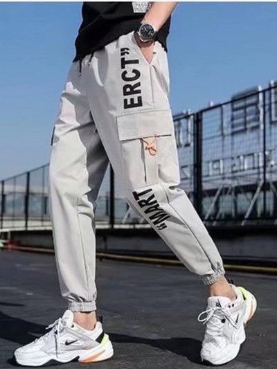 2023 Klasične ulične ležerne muške hlače s trakama za trčanje Muške uske proljetne kargo hlače Ženske hlače s više džepova