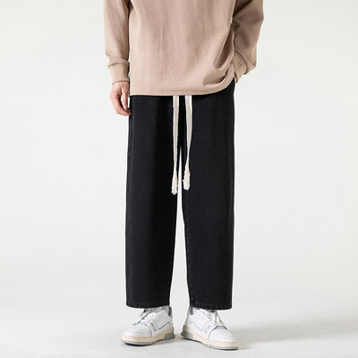 2023. aasta kevadsuvi, uued meeste sirge sääre ja laia säärega teksad Korea moodsa nööriga disainiga kottis pahkluuni ulatuvad meeste püksid