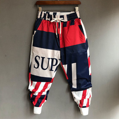 Muška odjeća široka muška odjeća u stilu za mlade Ulična odjeća s printom na elastični struk Patchwork uvezivanje Proljeće ljeto Tanke zgodne ležerne hlače
