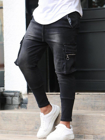 Meeste Stretch Teksad Mustad Suured küljetaskud Cargo Teksad Mood Tõmblukk Väike jalg Denimpüksid Elastsed Jooksupüksid Tänavarõivad