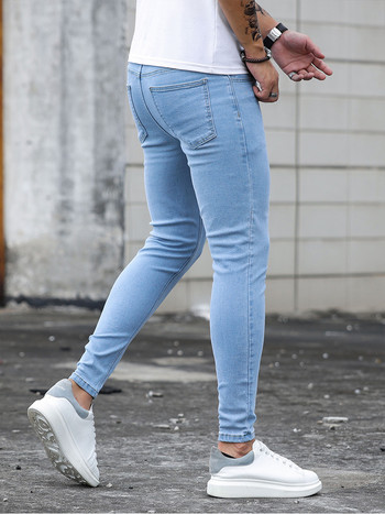 2023 Нови мъжки еластични тесни дънки Мъжки дизайнерски еластични дънкови панталони с молив с драскотини Дънки Streetwear Небесно сини модни дънки