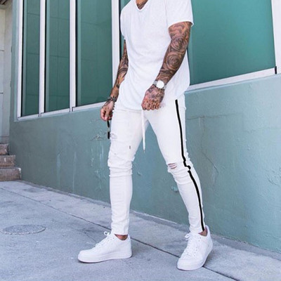 Mehed Teksad Põlveauk Rebenenud Stretch Kitsad Denimpüksid Ühevärvilised Must Sinine Sügissuvi Hip-Hop Stiilis Slim Fit Püksid S-4XL