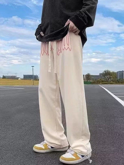 Ameerika stiilis kirjatrükis sirged püksid meestele High Street lahtised püksid vabaaja jooksjad hip-hop pingutusnööriga dressipüksid