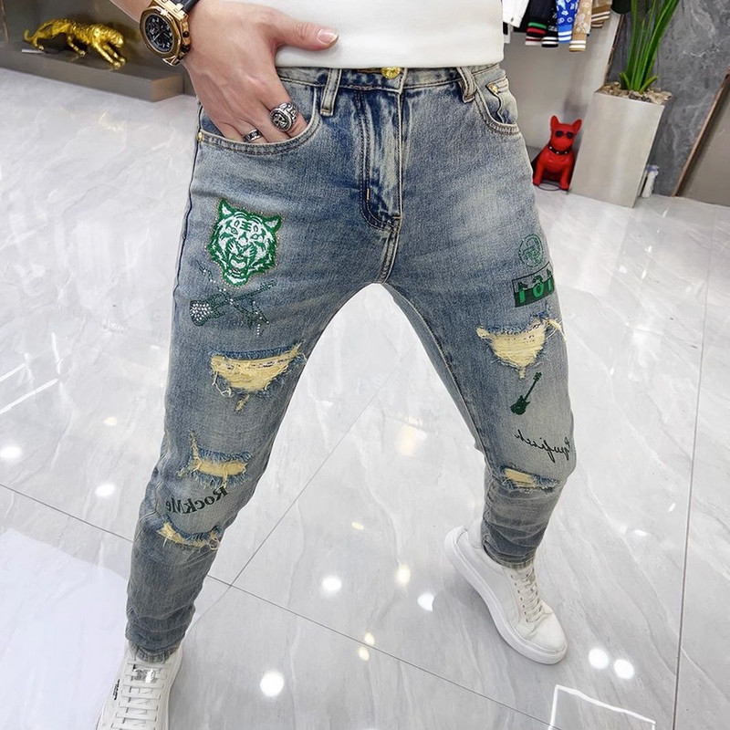Novodošle muške dizajnerske traperice Kpop stila Tigrasti vez Poderane korejske luksuzne ulične uske kaubojske rastezljive traper hlače
