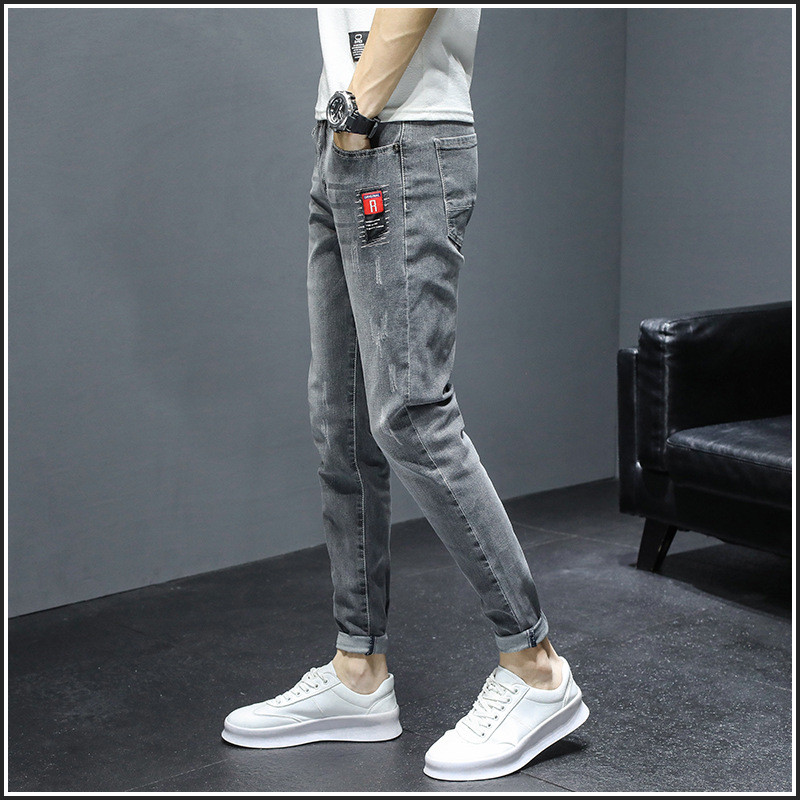 Καλοκαιρινό λεπτό τζιν ανδρική μάρκα μόδας 2022 άνοιξη και φθινόπωρο Κορεάτικη μόδα ευέλικτο slim fit μικρά πόδια μακριά παντελόνια ανδρικά