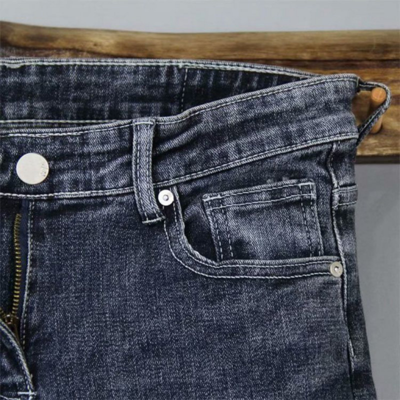 Kvaliteetsed stiilsed korea moe Kpop tööteksad meestele Tumesinine madala tõusuga kitsas veniv kauboi üliõpilaste teksapüksid