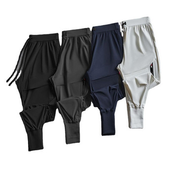 2023 Нова мода Gym Мъжки спортни панталони Ежедневни тренировъчни панталони с много джобове Ежедневни фитнес тренировъчни панталони за джогинг