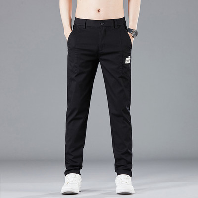 Proljeće ljeto Dizajn elastičnog struka Muške tanke ležerne hlače Korejske modne pamučne rastezljive poslovne hlače Muške sive plave