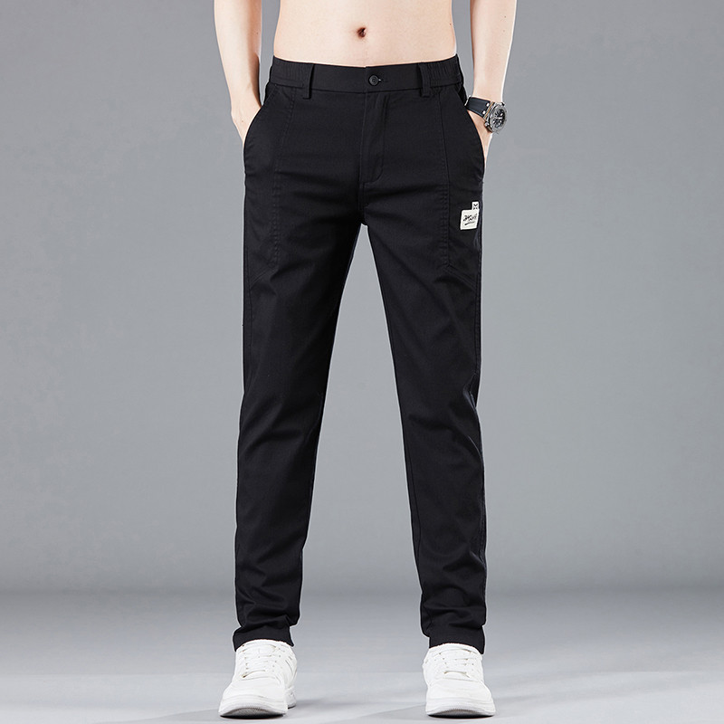 Proljeće ljeto Dizajn elastičnog struka Muške tanke ležerne hlače Korejske modne pamučne rastezljive poslovne hlače Muške sive plave
