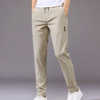 Пролет Лято Мъжки панталони Еластична талия Модерен корейски стил Ежедневни панталони с шнур Мъжки панталон с прав крачол за улично облекло