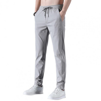 Uzice, elastični pojas, džepovi, ledena svila, muške hlače, ljetne jednobojne tanke hlače ravnog kroja, dnevna odjeća