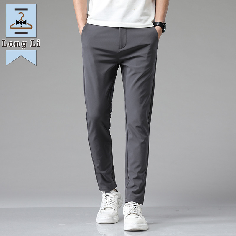 Ljetne ležerne hlače za 2023. Muške tanke poslovne rastezljive uske trkače s elastičnim strukom Korejske klasične tanke crno sive plave hlače muške