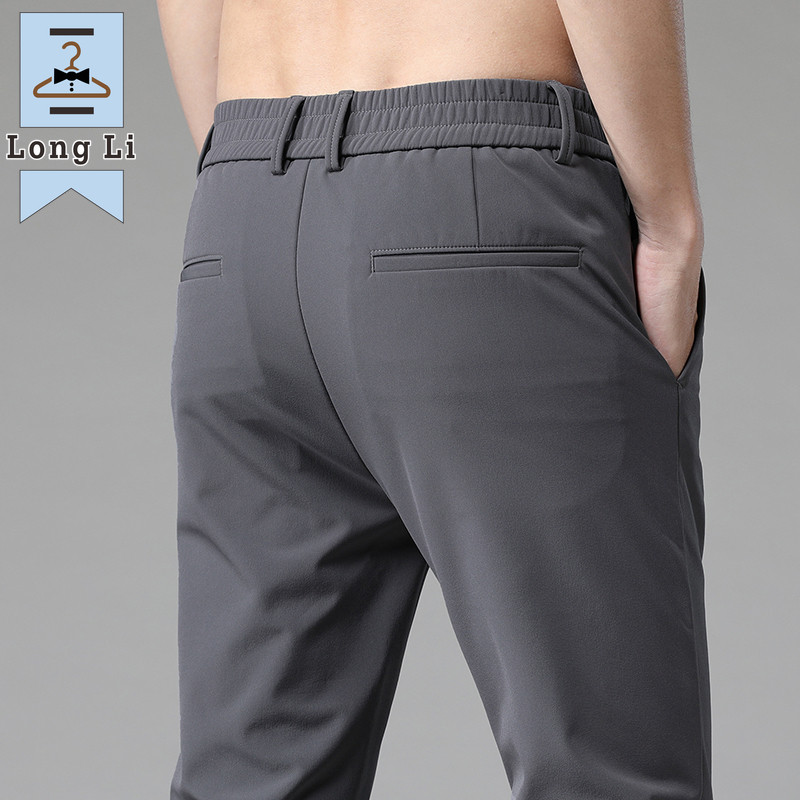 Ljetne ležerne hlače za 2023. Muške tanke poslovne rastezljive uske trkače s elastičnim strukom Korejske klasične tanke crno sive plave hlače muške