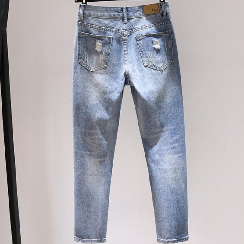 Rebenenud prindiga püksid Kpop katkised meeste kauboipüksid kitsad kitsenevad retro-rebitud aukudega teksad meestele Helesinised kõhn punk