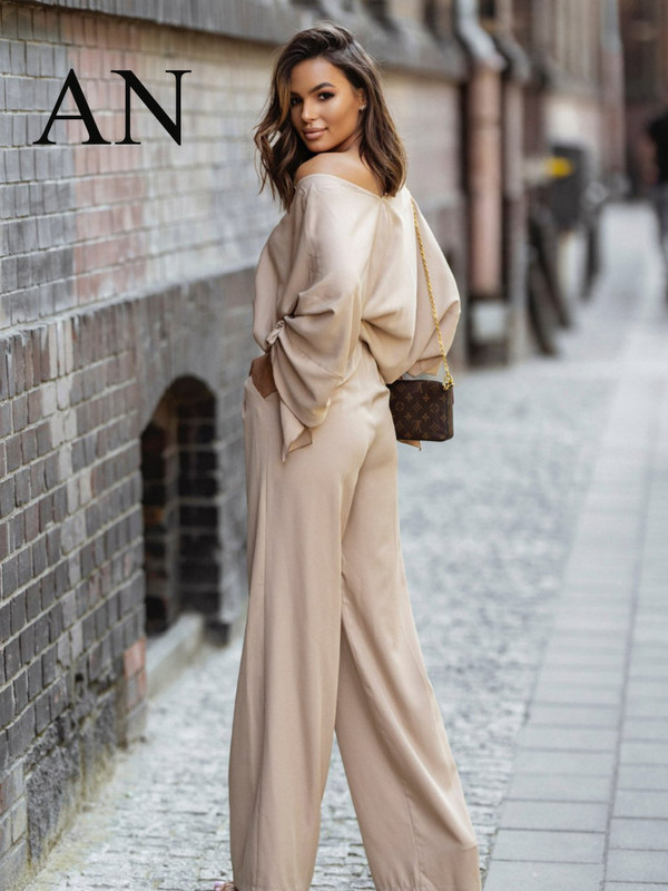 Kaheosaline naiste komplekt 2023 tänavastiilis ühevärviline moodne V-kaelusega nöörpükste komplekt Elegantne naiste komplekt