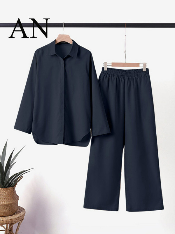 Naiste kaheosaline komplekt Naiste 2023. aasta revääridega pikkade varrukatega särk Kevad-suvised vabaaja ühevärvilised püksid, laia säärega püksikomplektid