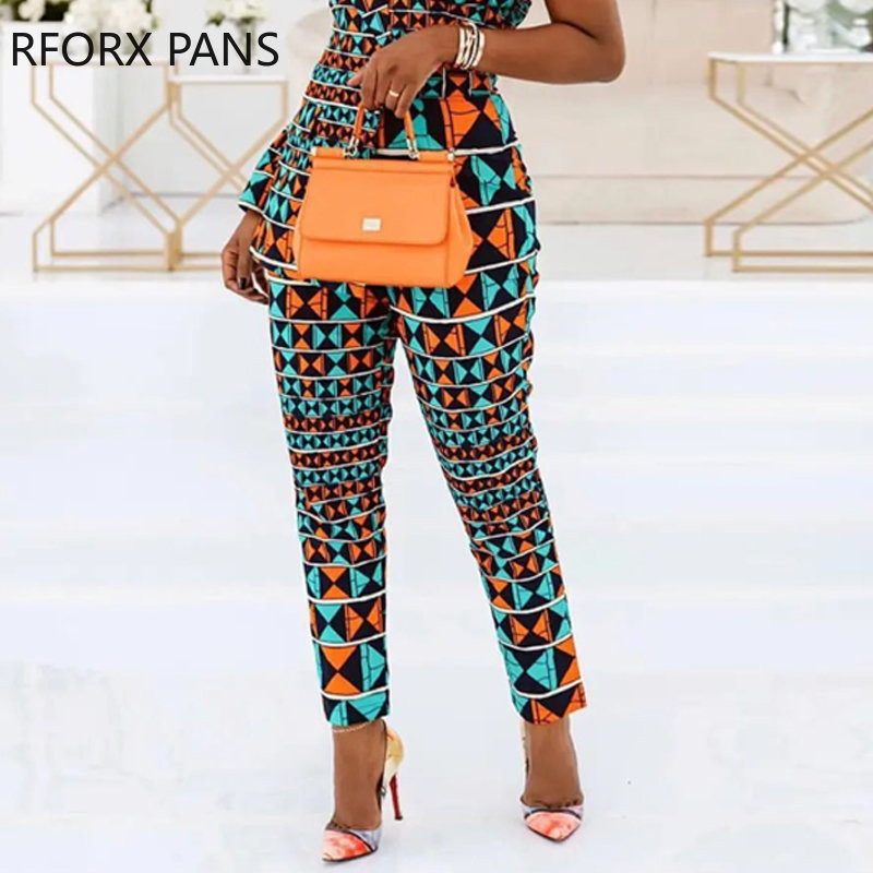 Ženski radni kombinezon s elegantnim geometrijskim uzorkom na jedno rame i dugim rukavima do gležnja