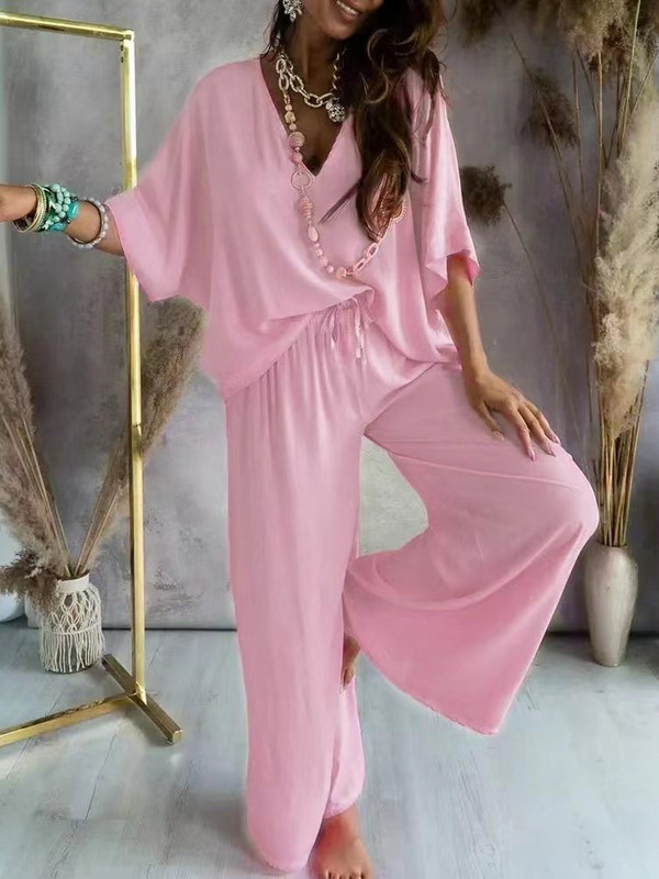 Naiste vabaaja avarad 2 tk ülikonnad Moodne V-kaelusega pluus Valge laia säärega pükste komplektid Naiste elegantsed varrukatega nahkhiirekomplektid, sügise boho komplektid