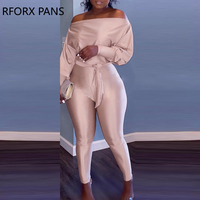 Ženski elegantni kombinezon s otvorenim ramenima i dugim rukavima, jednobojni, uski nogavica s remenom