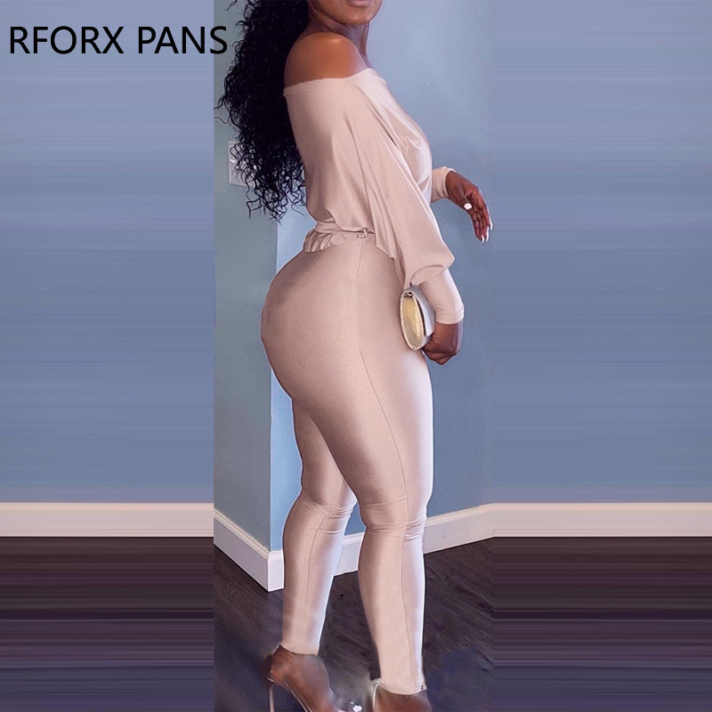 Ženski elegantni kombinezon s otvorenim ramenima i dugim rukavima, jednobojni, uski nogavica s remenom
