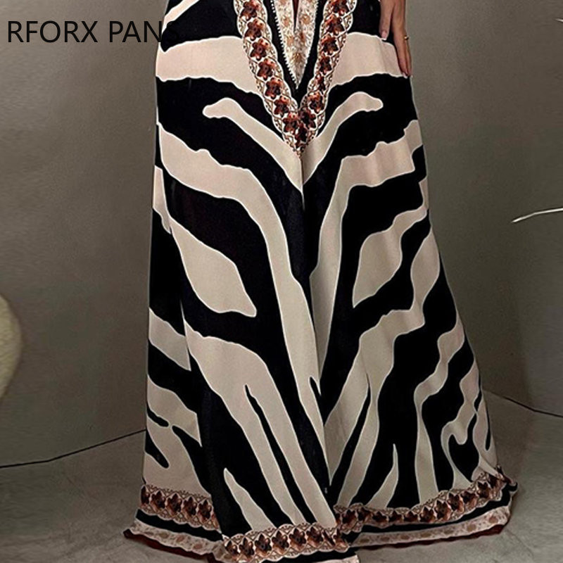 2023. aasta naiste elegantsed üleni prinditud Criss Cross päitsetega varrukateta sügava V kaelusega seksikad sirge säärega kombinesoonid