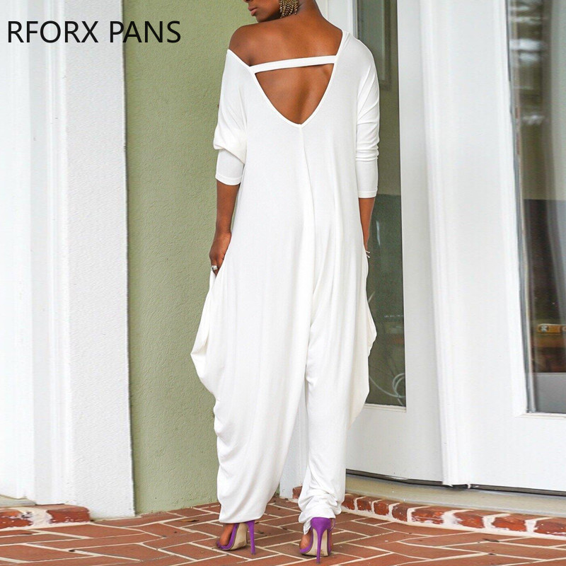 Ženski šik ležerni jednobojni široki haremski kombinezon s dubokim V izrezom i džepom