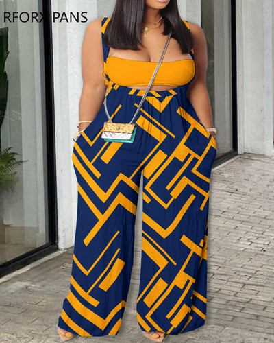 Ženski patchwork uzorak velike veličine, traper kombinezon sa širokim nogavicama i naramenicama.