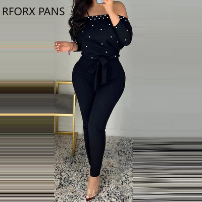 Naiste elegantne õlgadeta pärlitega pikkade varrukatega kombinesoon koos vööga